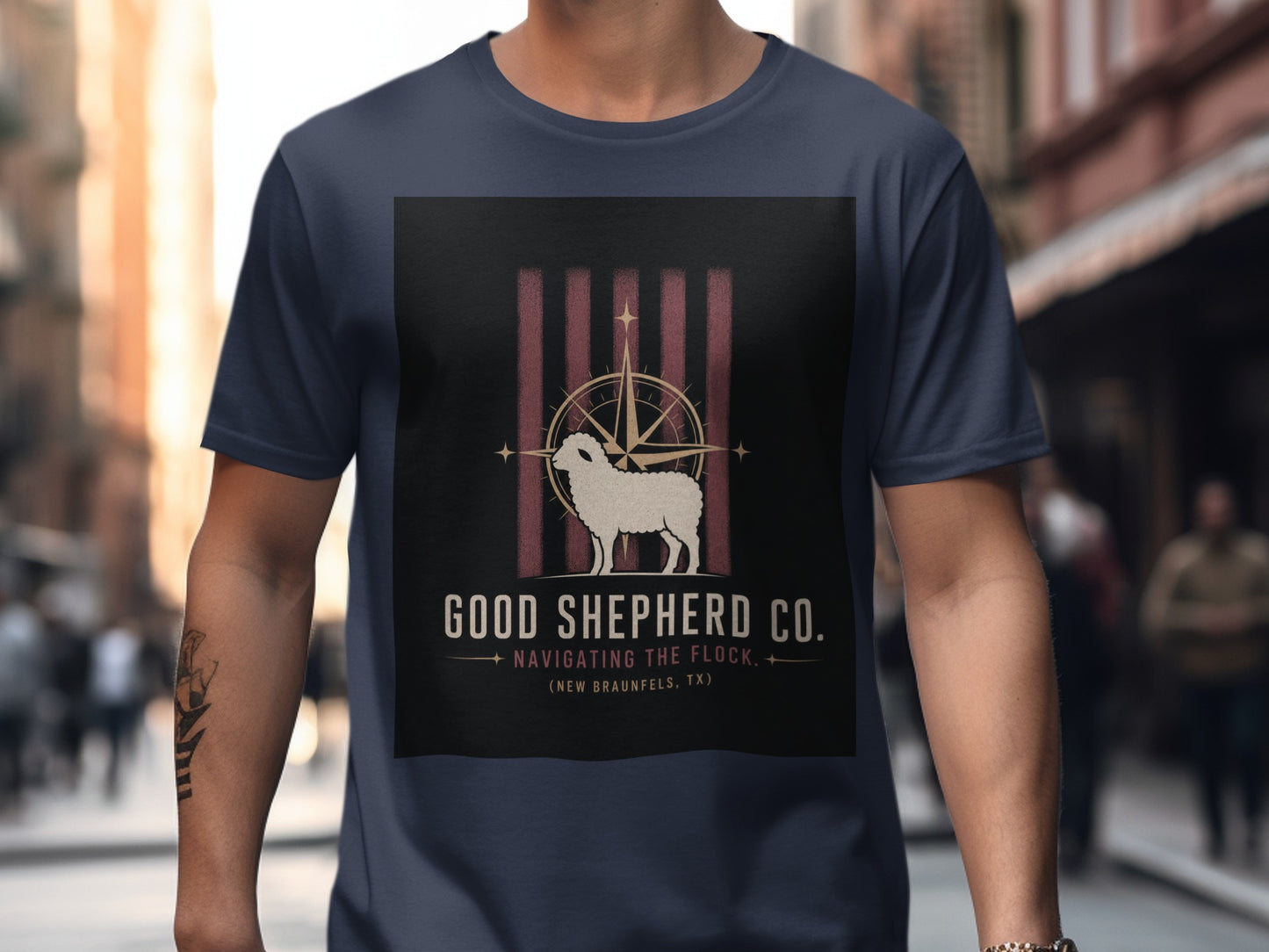 Dark blue t-shirt with "Good Shepherd Co. Navigating the Flock (New Braunfels, TX)" graphic.