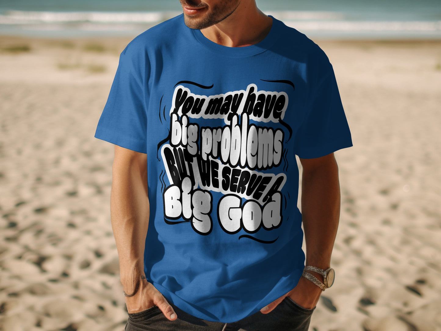 Blue t-shirt with white text saying "You may have big problems BUT WE SERVE A Big God".