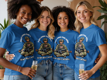 Four smiling women wear blue shirts with military-themed graphic and text.
