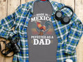 Grey t-shirt with "Made in Mexico Pefected as a Dad" text and rooster graphic.