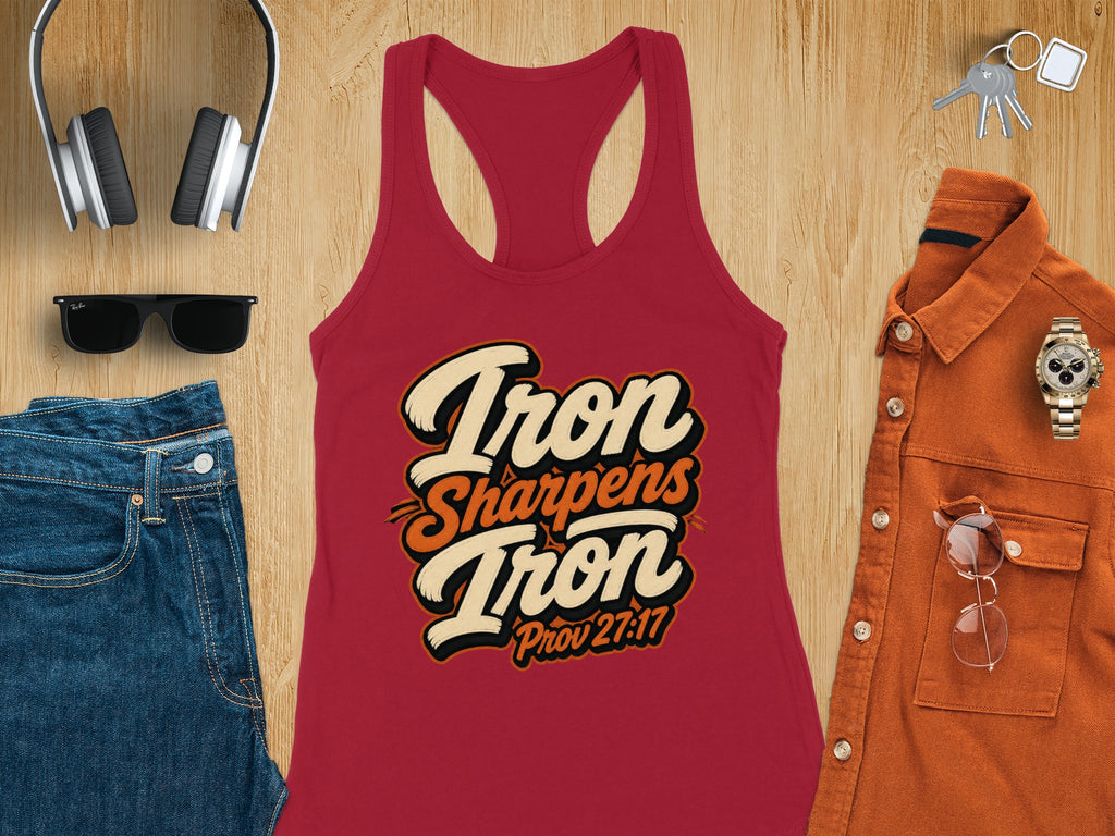 Red tank top with "Iron Sharpens Iron Prov 27:17" text, jeans, headphones, sunglasses, shirt, watch, and keys.