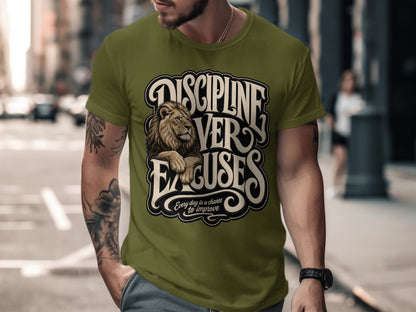 Olive green t-shirt with "Discipline Over Excuses" and a lion graphic.