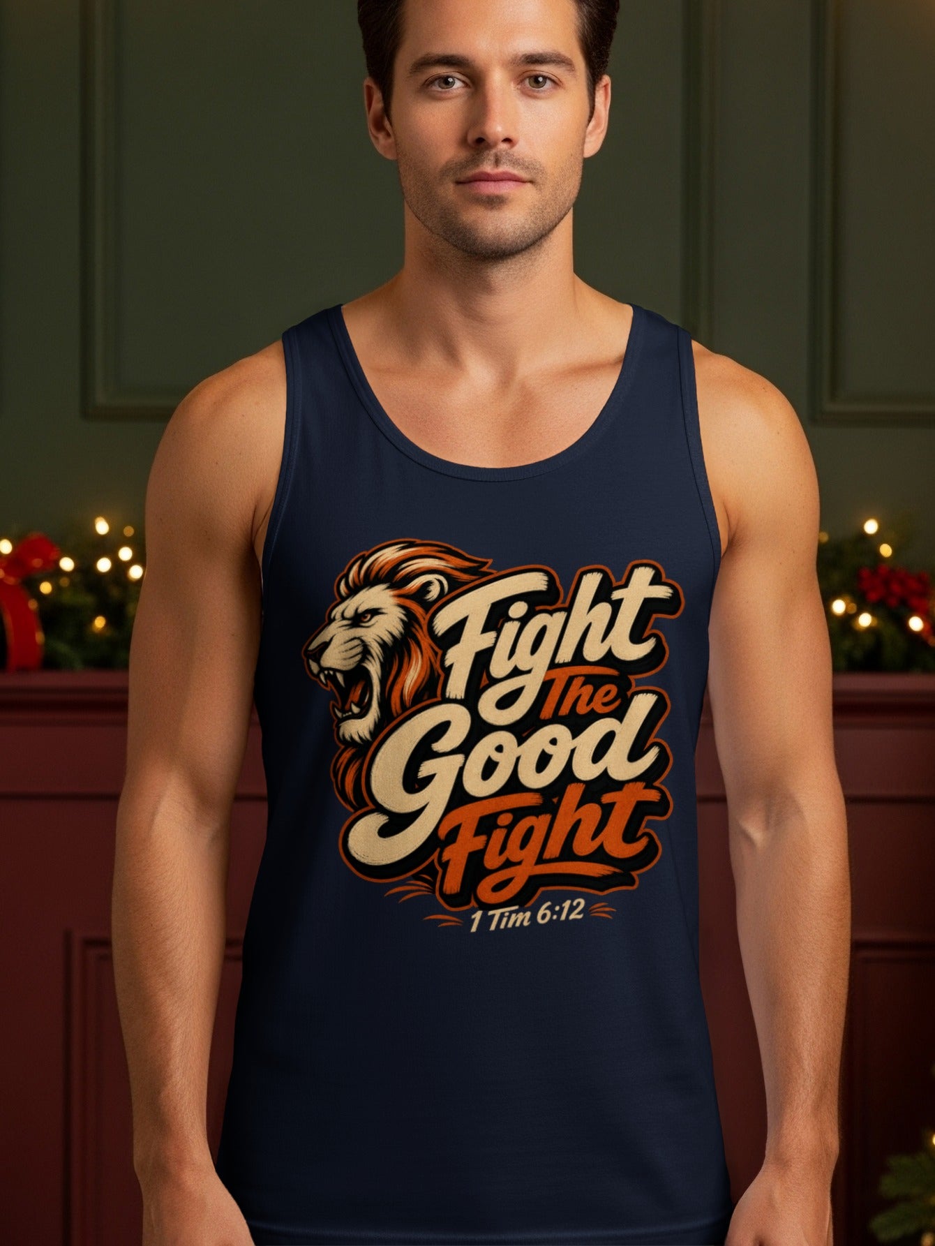 Dark blue tank top with a roaring lion graphic and text "Fight the Good Fight" and "1 Tim 6:12".