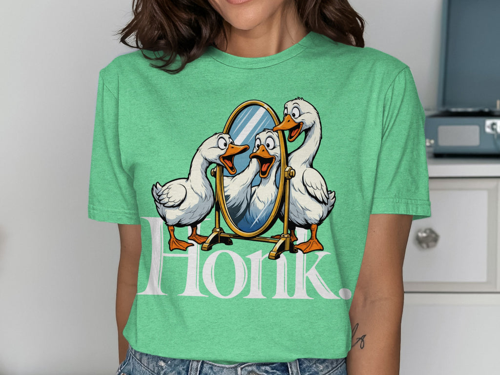 Three excited geese look into a mirror with the word "HONK" below.