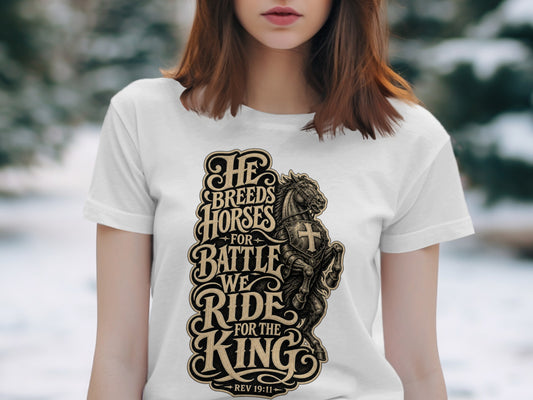 White t-shirt with text "He Breeds Horses for Battle, We Ride for the King" and a horse.