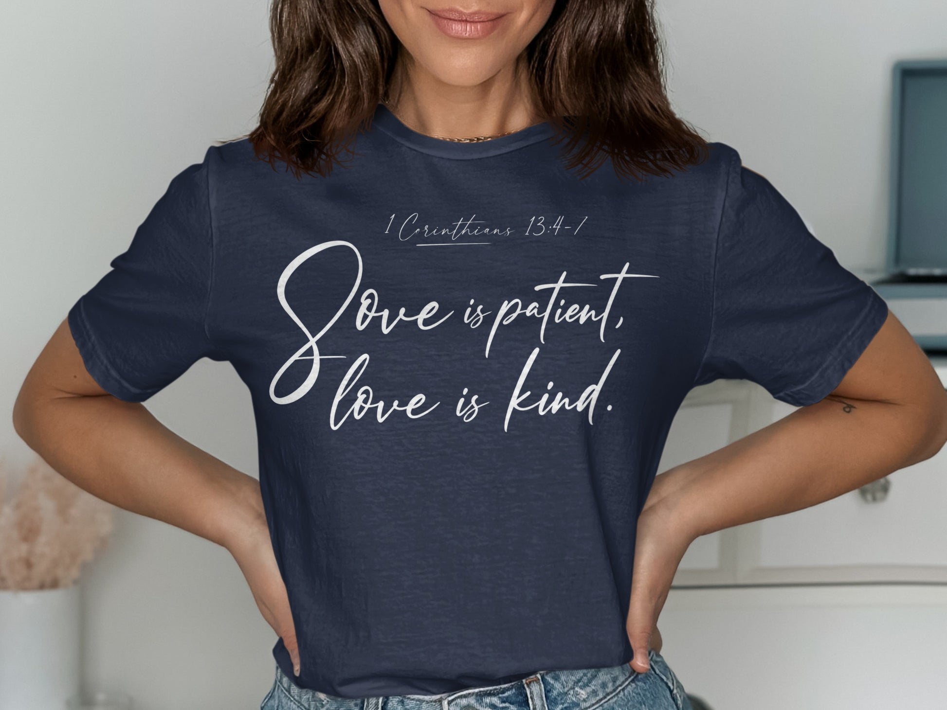 Navy t-shirt with white text: "1 Corinthians 13:4-7 Love is patient, love is kind."