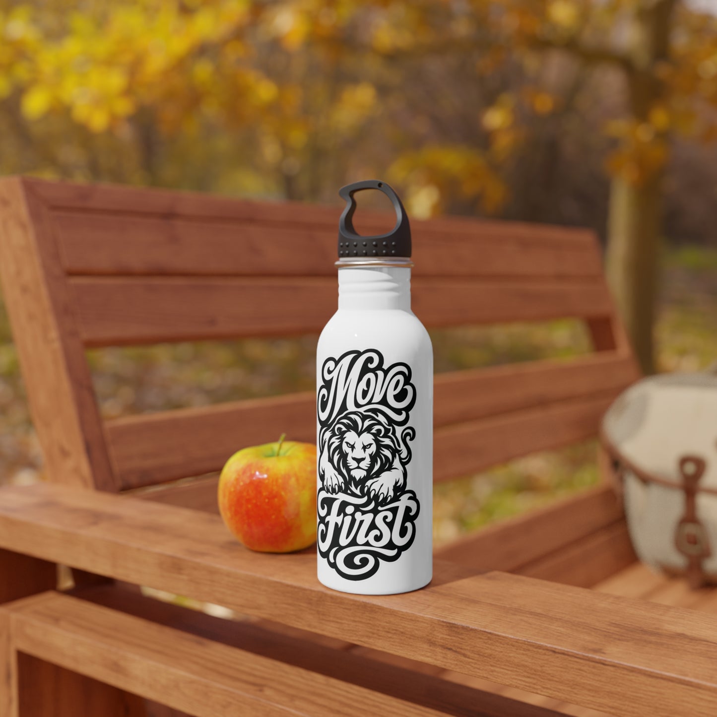 White water bottle with black text "Move First" and lion graphic, next to an apple.