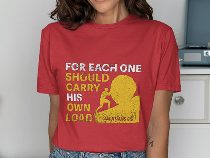 Red t-shirt with text "FOR EACH ONE SHOULD CARRY HIS OWN LOAD GALATIANS 6:5".