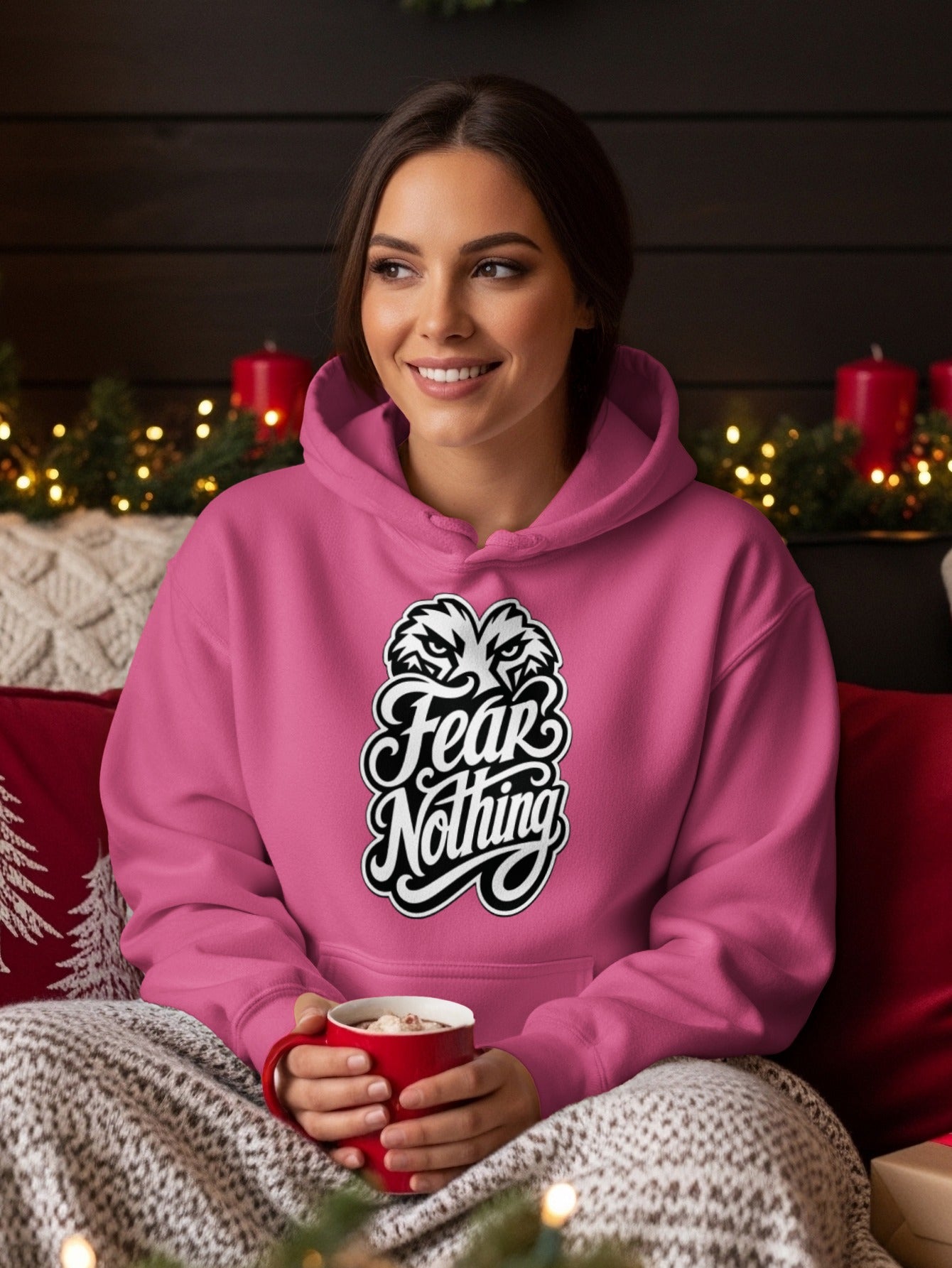 Pink hoodie with "Fear Nothing" text and eagle graphic on chest.