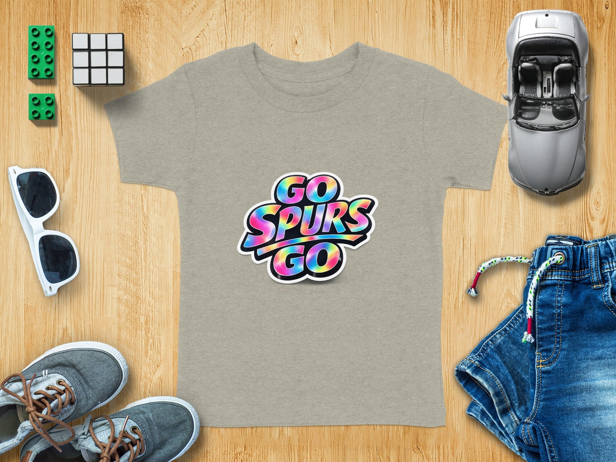 Grey t-shirt with "GO SPURS GO" text graphic in rainbow tie-dye style.