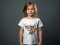 T-shirt with cartoon coyote holding "Go Spurs Go!" sign and basketball.