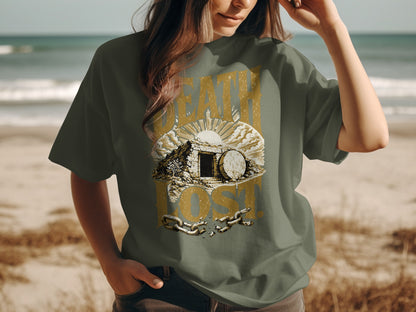 Olive shirt with tomb illustration and text "DEATH LOST" and broken chains.
