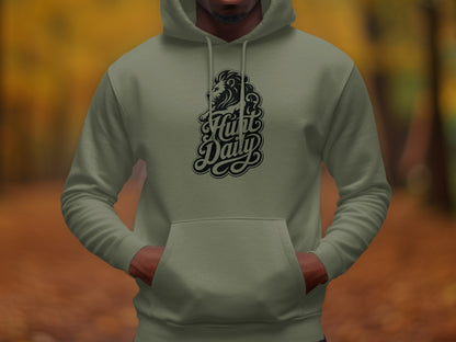Green hooded sweatshirt with a lion and "Hunt Daily" text on the chest.