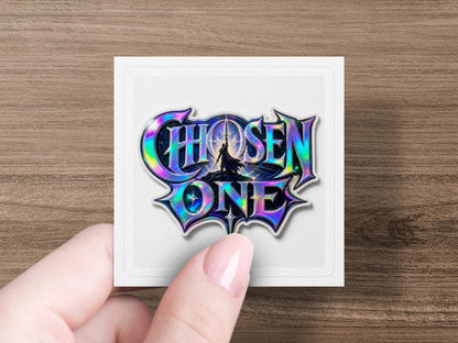 Holographic sticker of "CHOSEN ONE" logo with a silhouetted figure and sword.