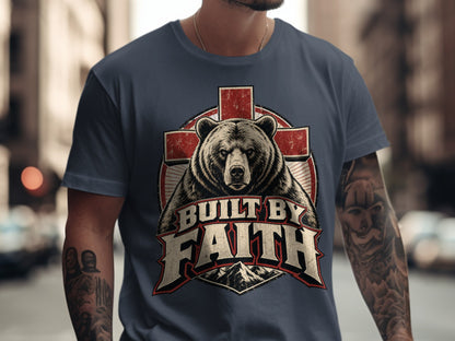 Bear and cross graphic on a t-shirt with text "BUILT BY FAITH".