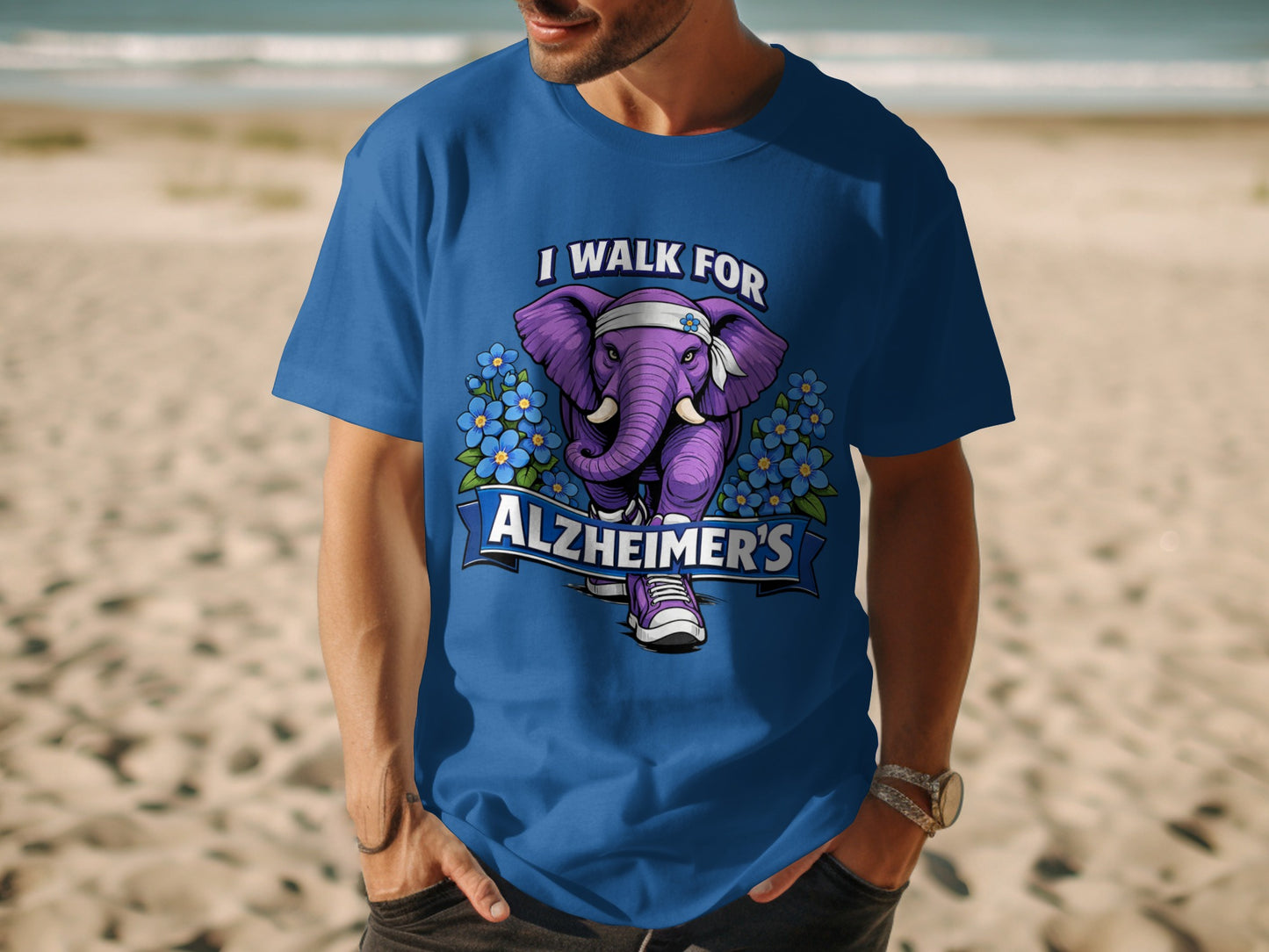 Blue t-shirt with purple elephant and text "I Walk For Alzheimer's".