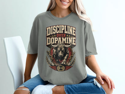 T-shirt with "DISCIPLINE OVER DOPAMINE" text and charging bull graphic.