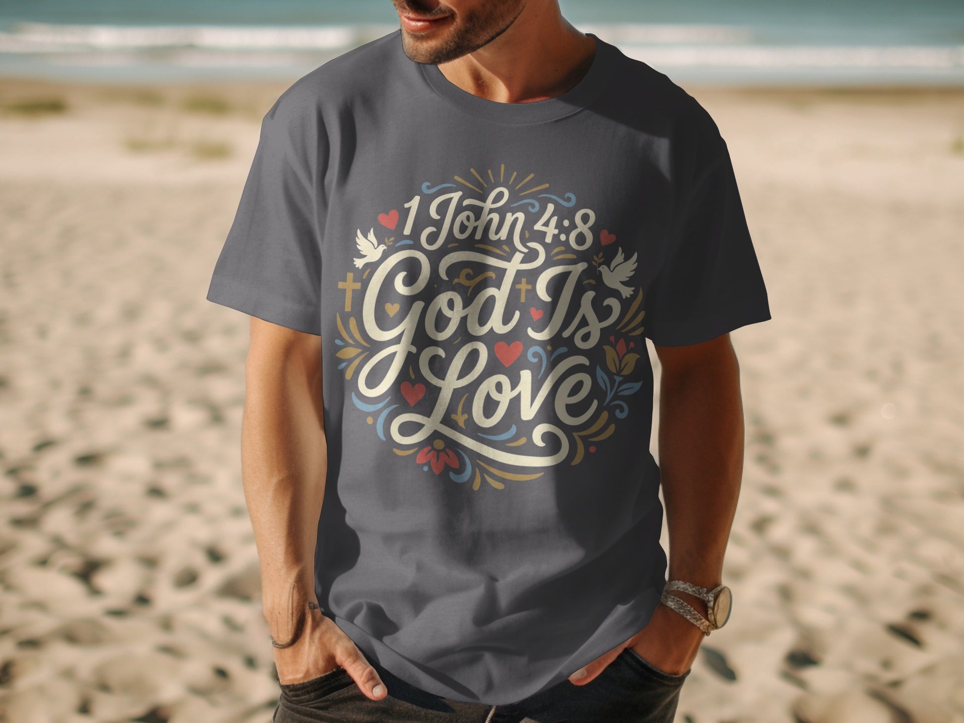Dark gray t-shirt with "1 John 4:8 God Is Love" text and decorative elements.