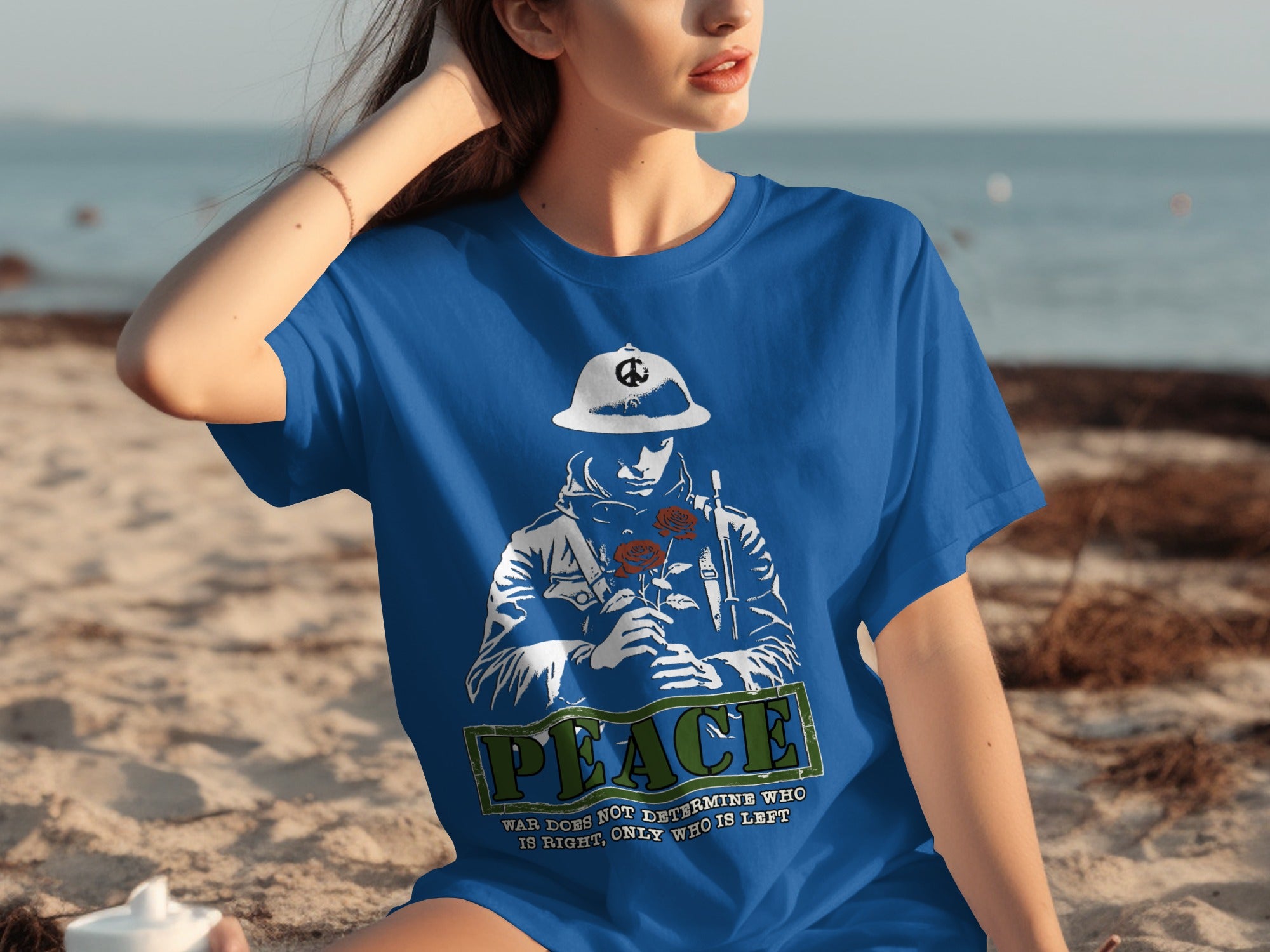 Blue t-shirt with graphic of soldier holding roses, "PEACE" text, and slogan.