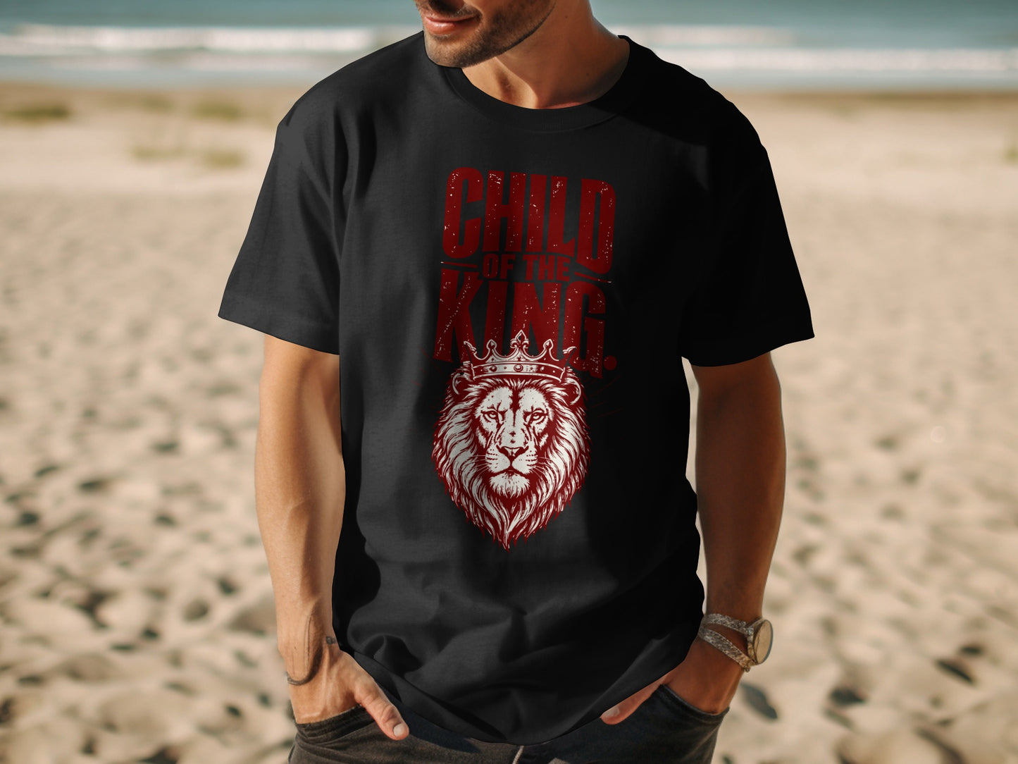 Black t-shirt with red distressed text "CHILD OF THE KING" above a lion wearing a crown.