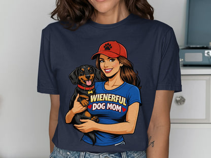 Woman in blue shirt holding a dachshund with text "Wienerful Dog Mom".