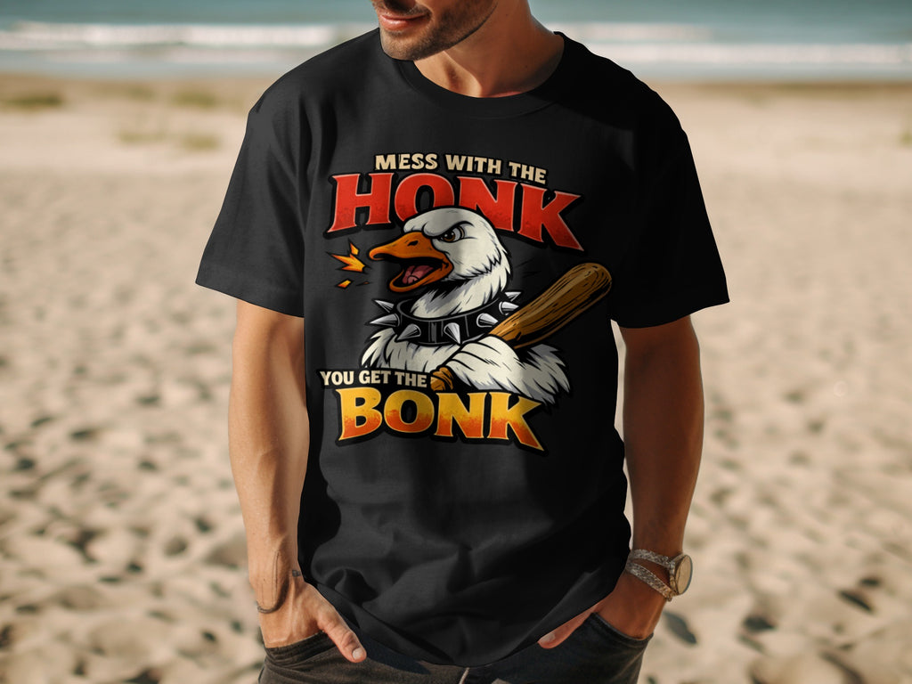 Black t-shirt with graphic of an angry goose holding a baseball bat.