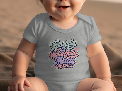 Gray baby onesie with "Fearfully & Wonderfully Made Ps139:14" text.