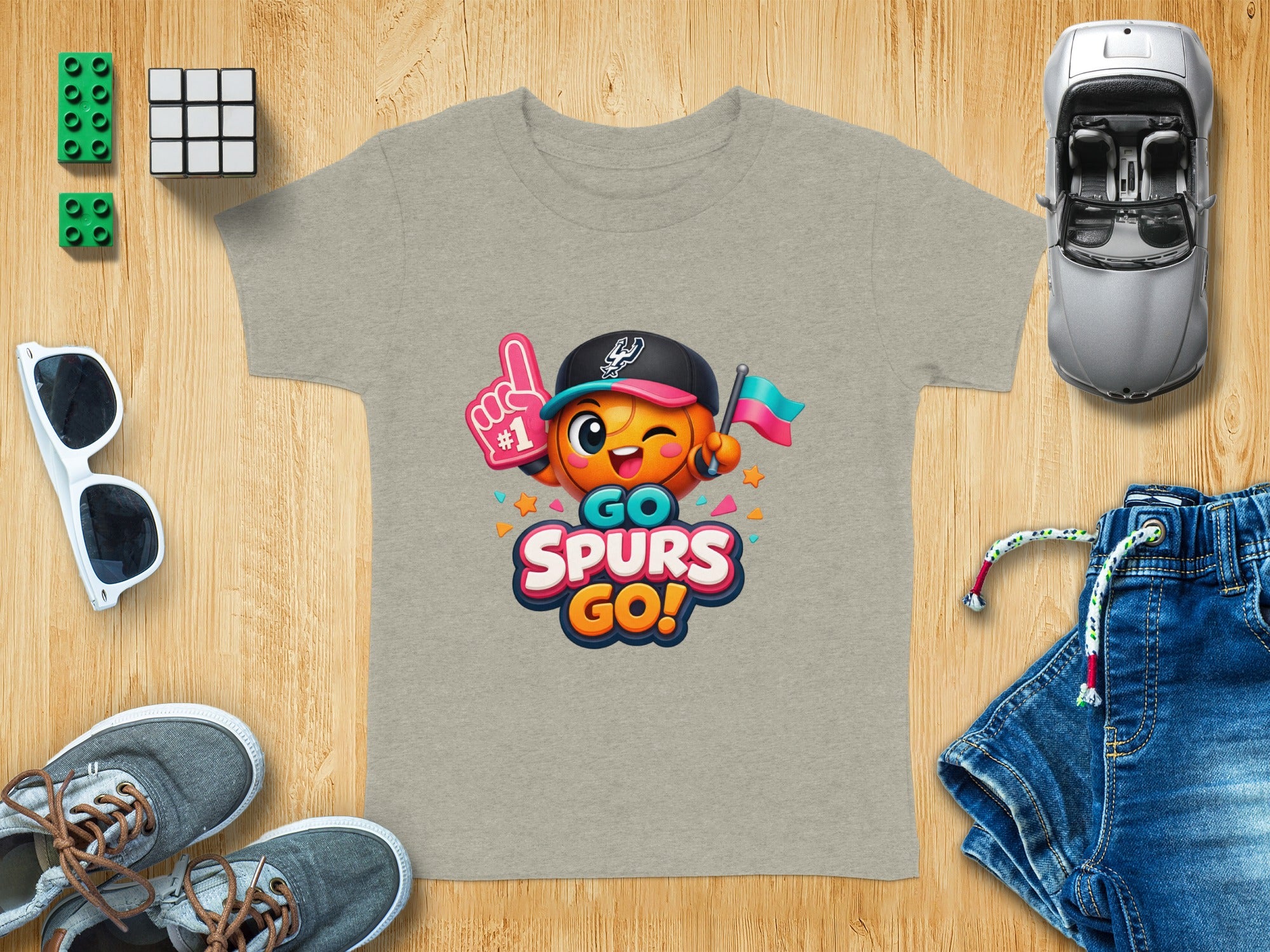 Grey t-shirt with cartoon basketball character and "GO SPURS GO!" text.