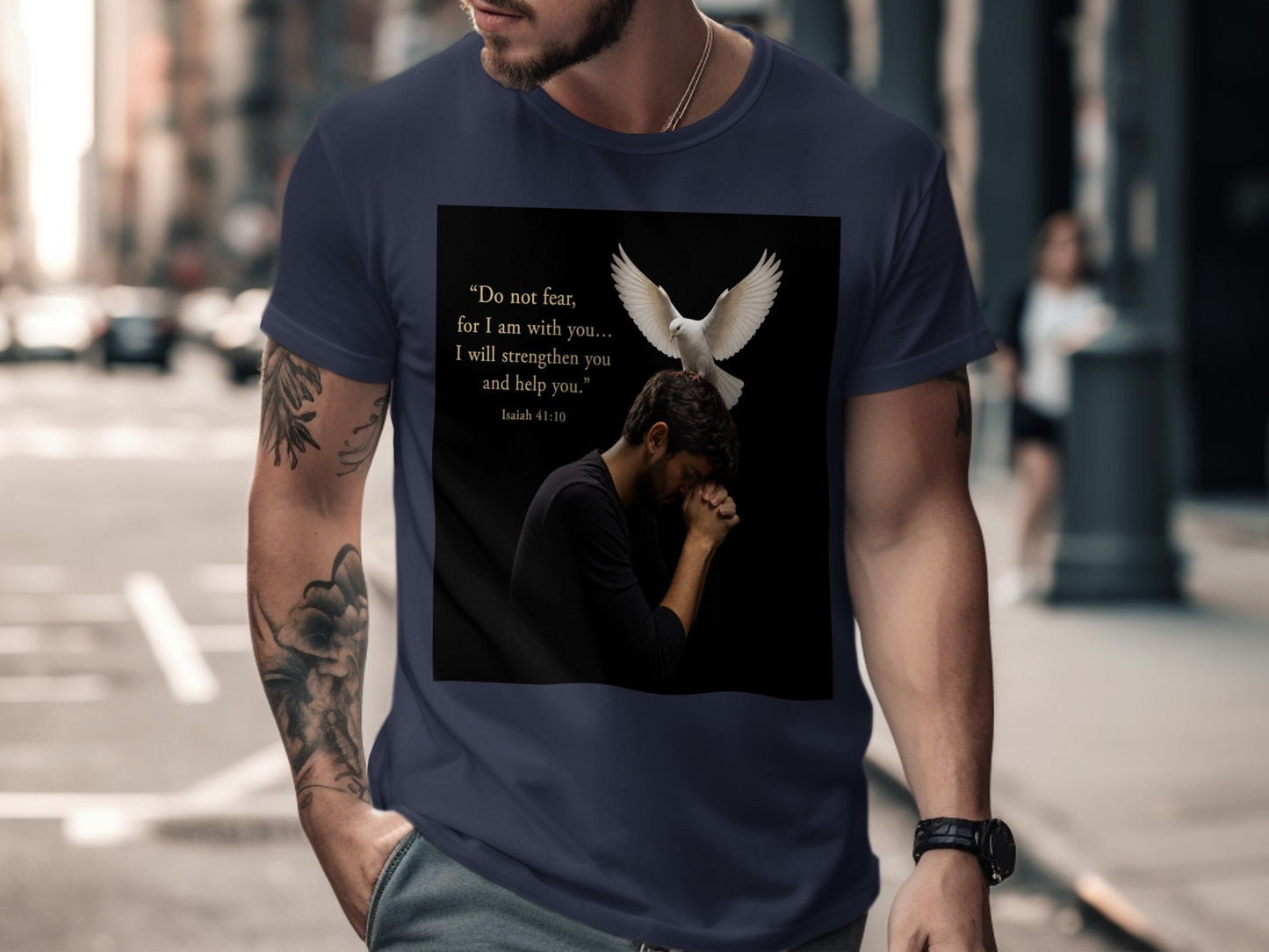 T-shirt graphic with praying man, dove, and Bible verse Isaiah 41:10.
