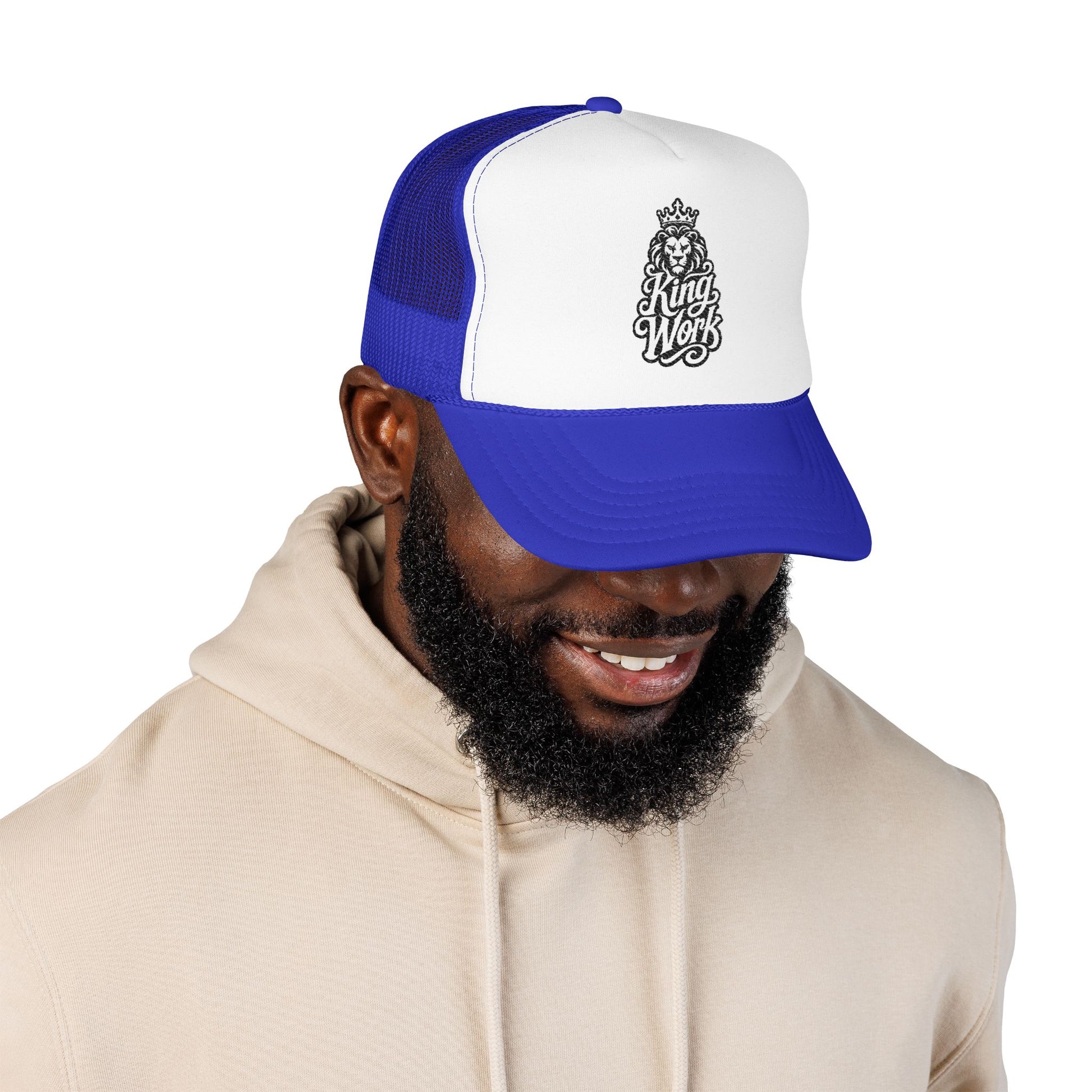 Blue and white trucker hat with black lion and King Work logo.