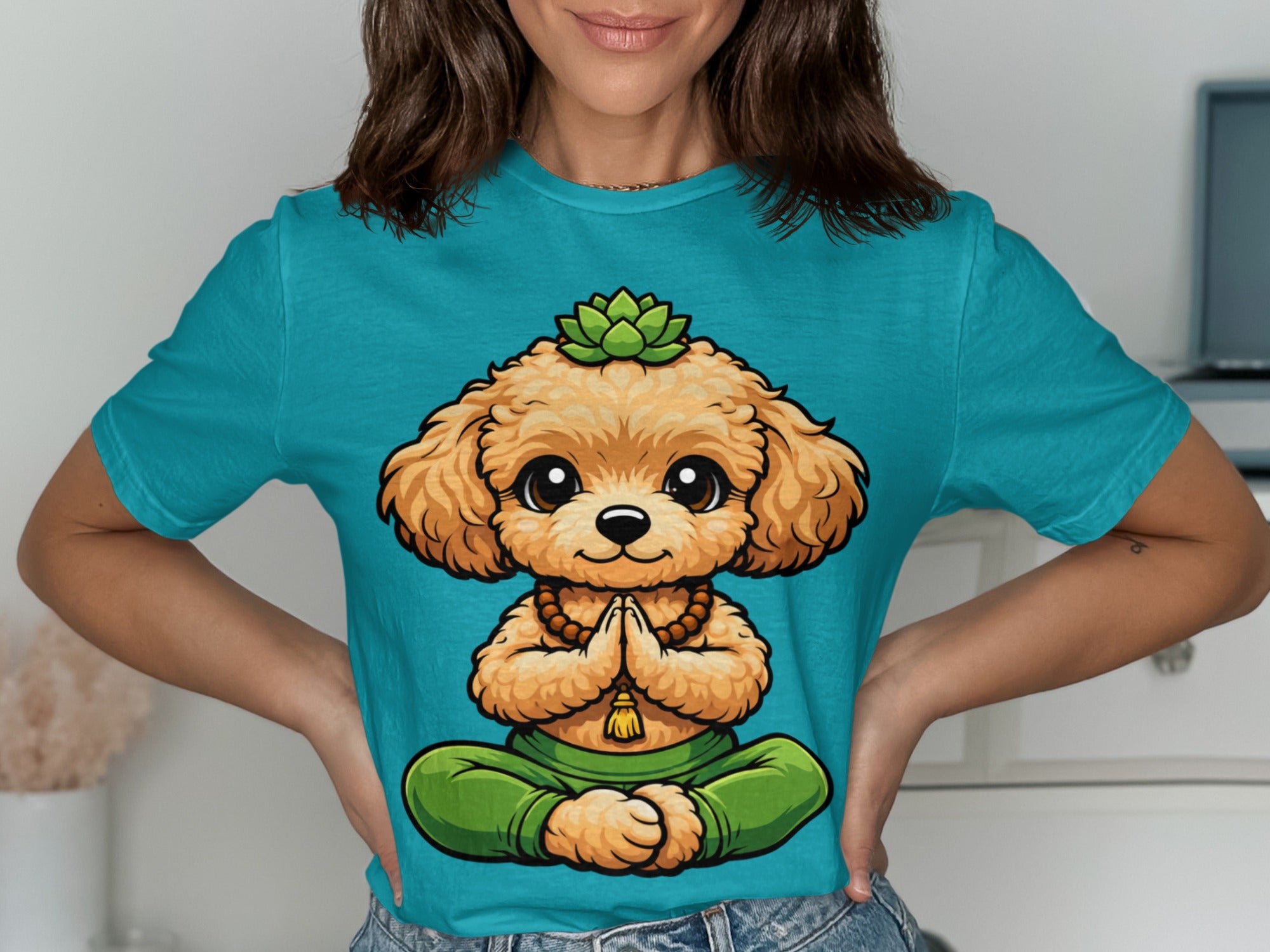 Teal t-shirt graphic of a brown poodle meditating with a succulent on its head.