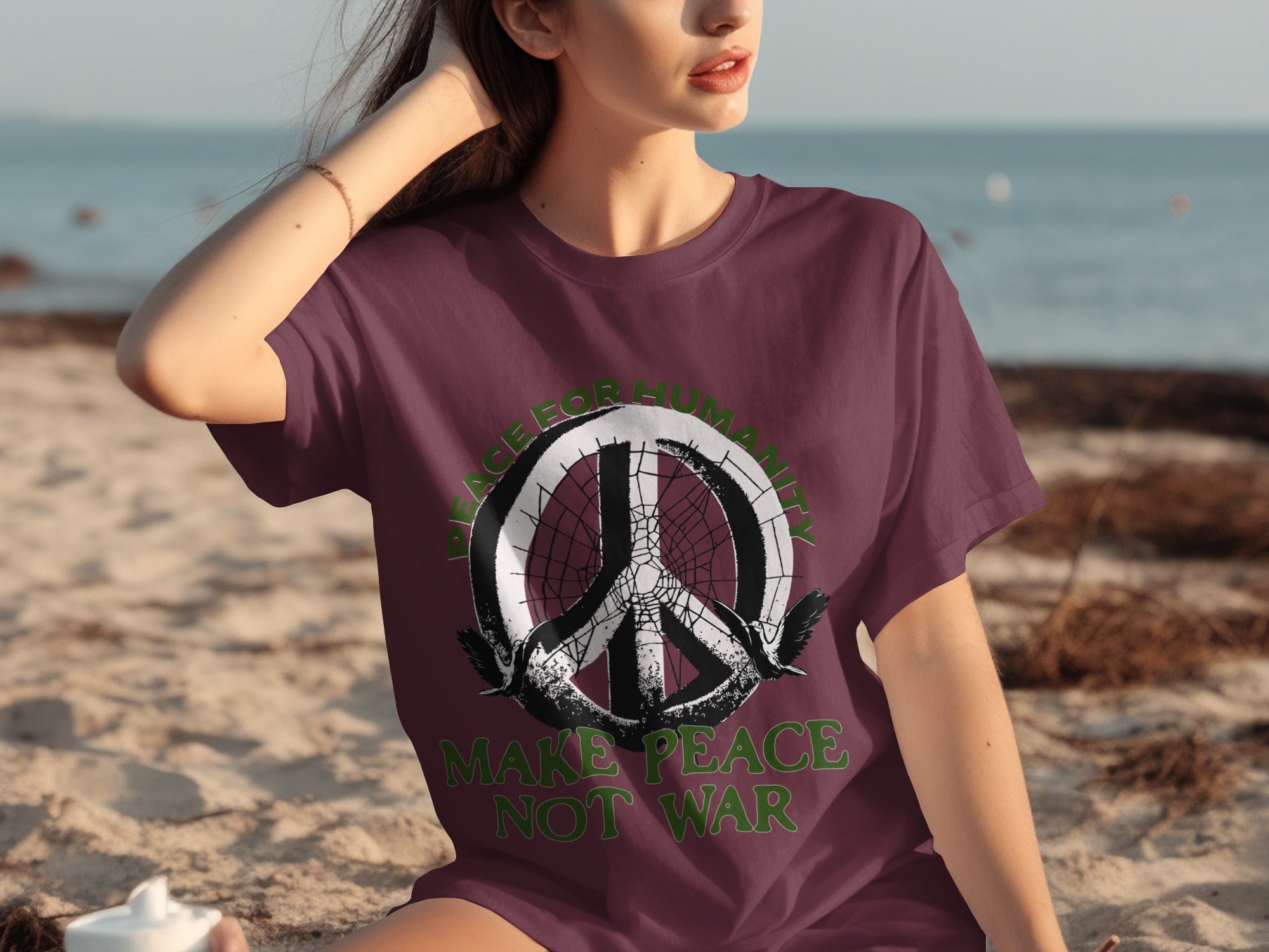 Maroon t-shirt with peace sign, birds, and text "Peace for Humanity" and "Make Peace Not War".