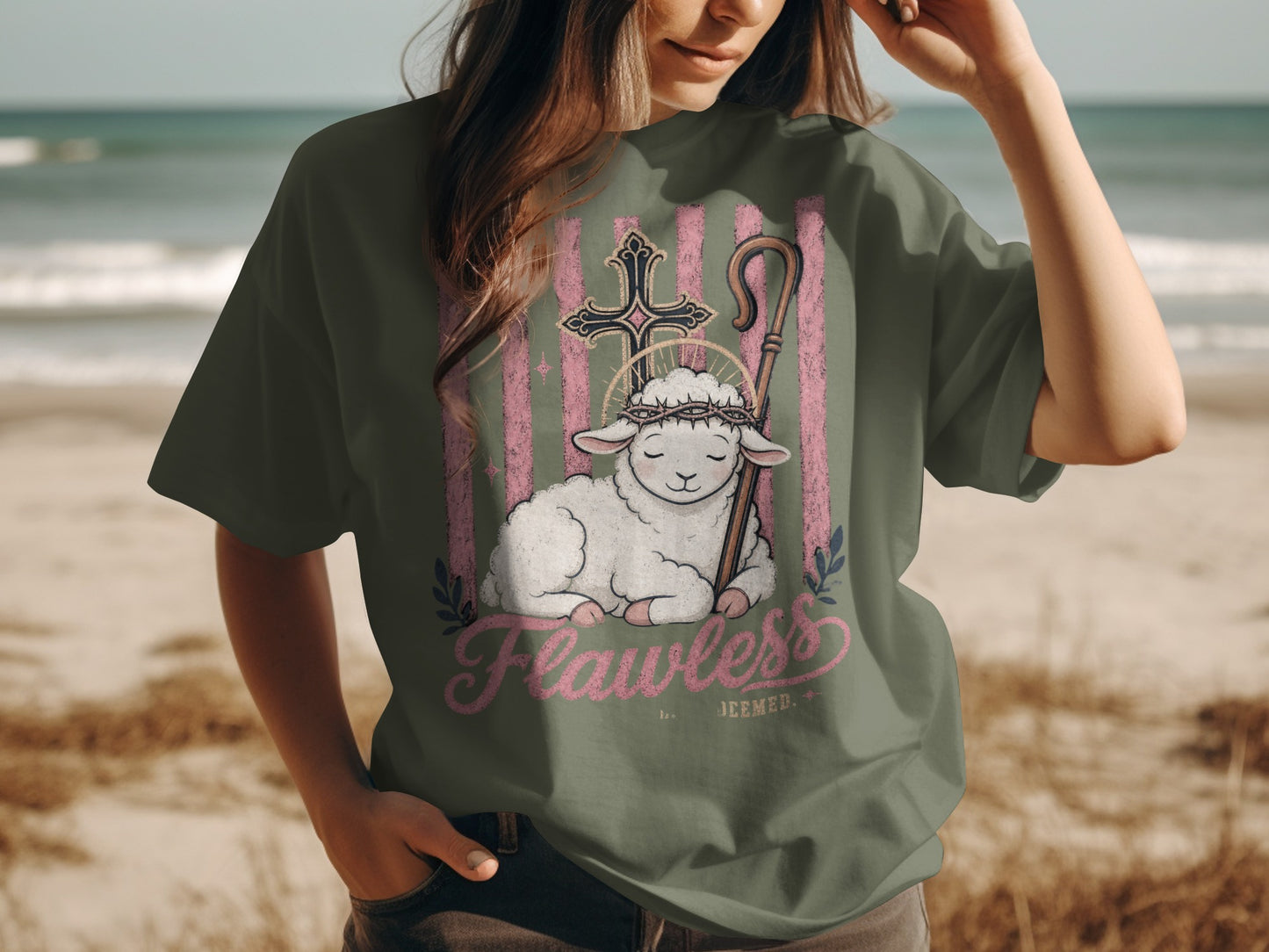 Flawless Deemed graphic on a t-shirt with lamb, cross, and shepherd's crook.