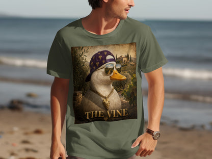 T-shirt graphic of a duck wearing a backwards cap, sunglasses, and a gold chain with grape pendant, text "THE VINE".