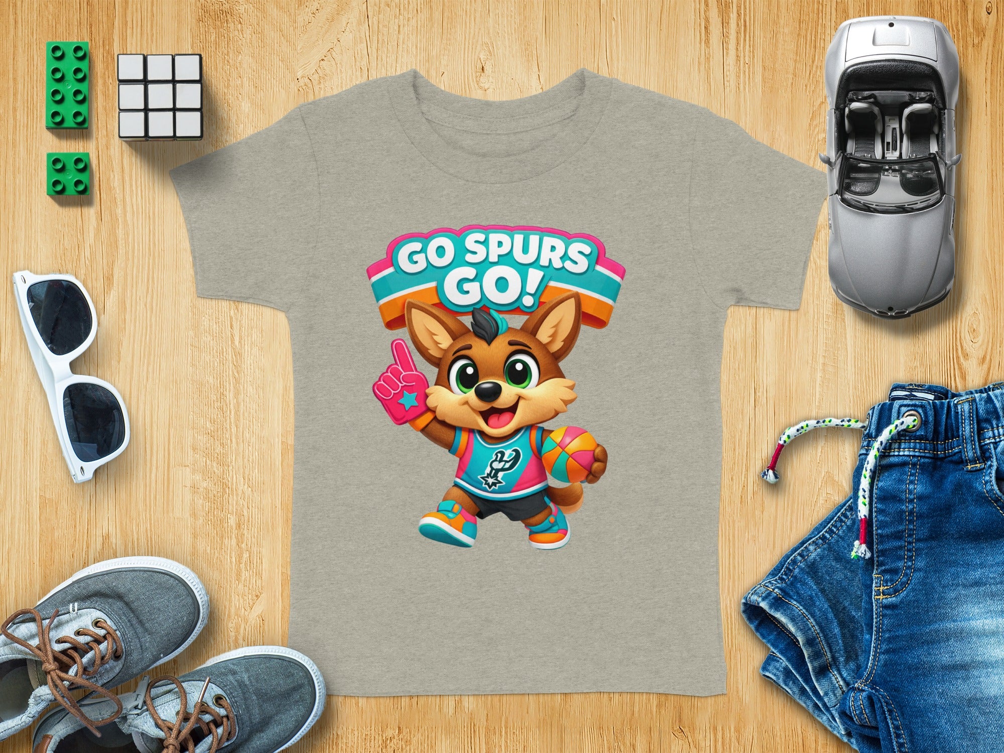 Kid's t-shirt with cartoon dog mascot holding basketball and text "GO SPURS GO!"