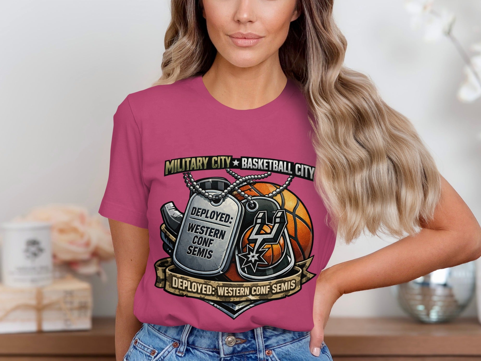 Pink t-shirt with military dog tags and basketball graphic, text: "MILITARY CITY BASKETBALL CITY"