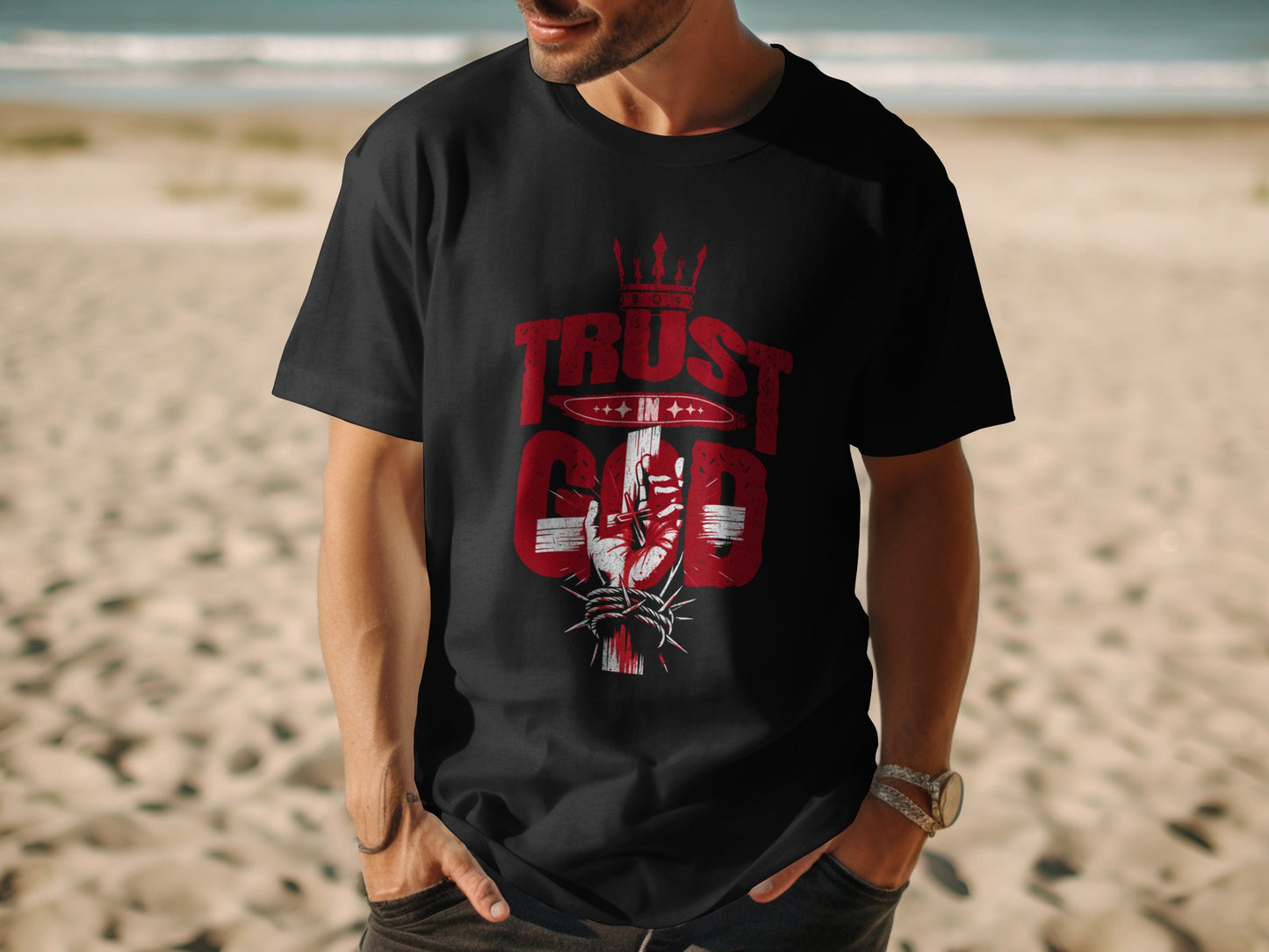 Black t-shirt with red text and graphics reading "TRUST IN GOD" with a crown and a hand.