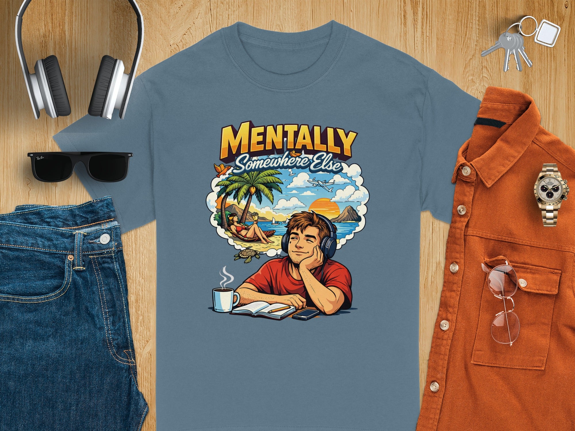 T-shirt with "Mentally Somewhere Else" beach scene graphic.