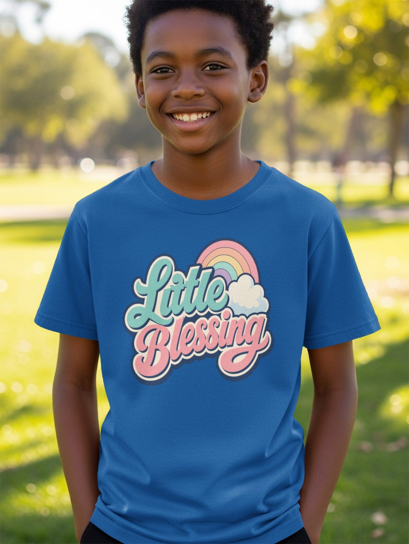 Royal blue t-shirt with "Little Blessing" text and rainbow graphic