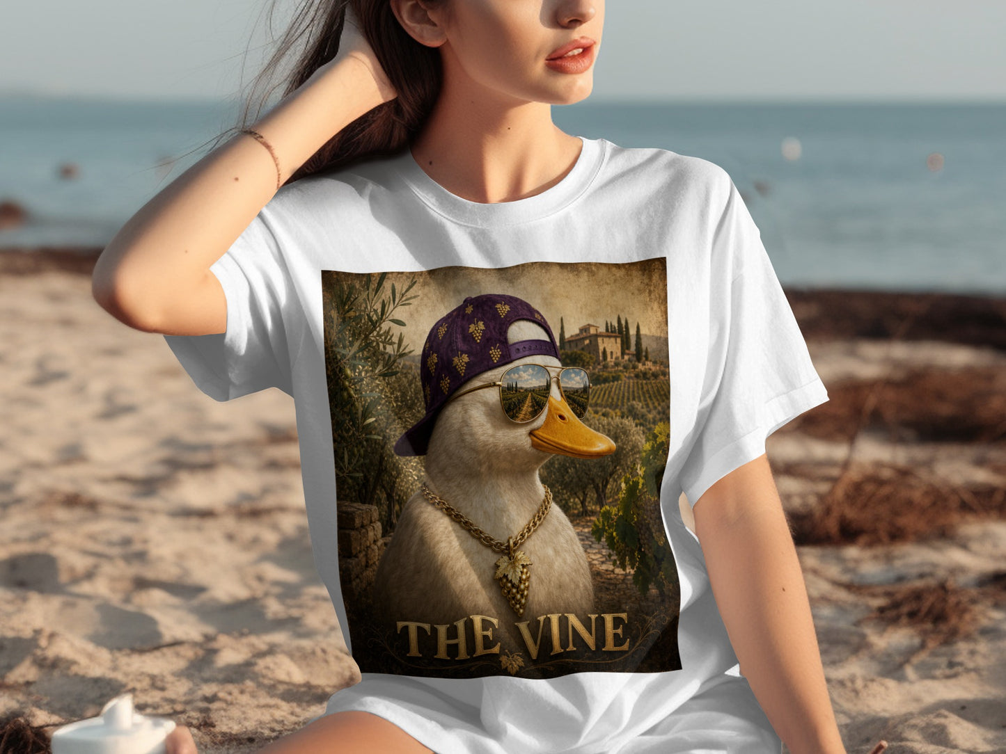 T-shirt design featuring a duck wearing a cap and sunglasses with the text "THE VINE".