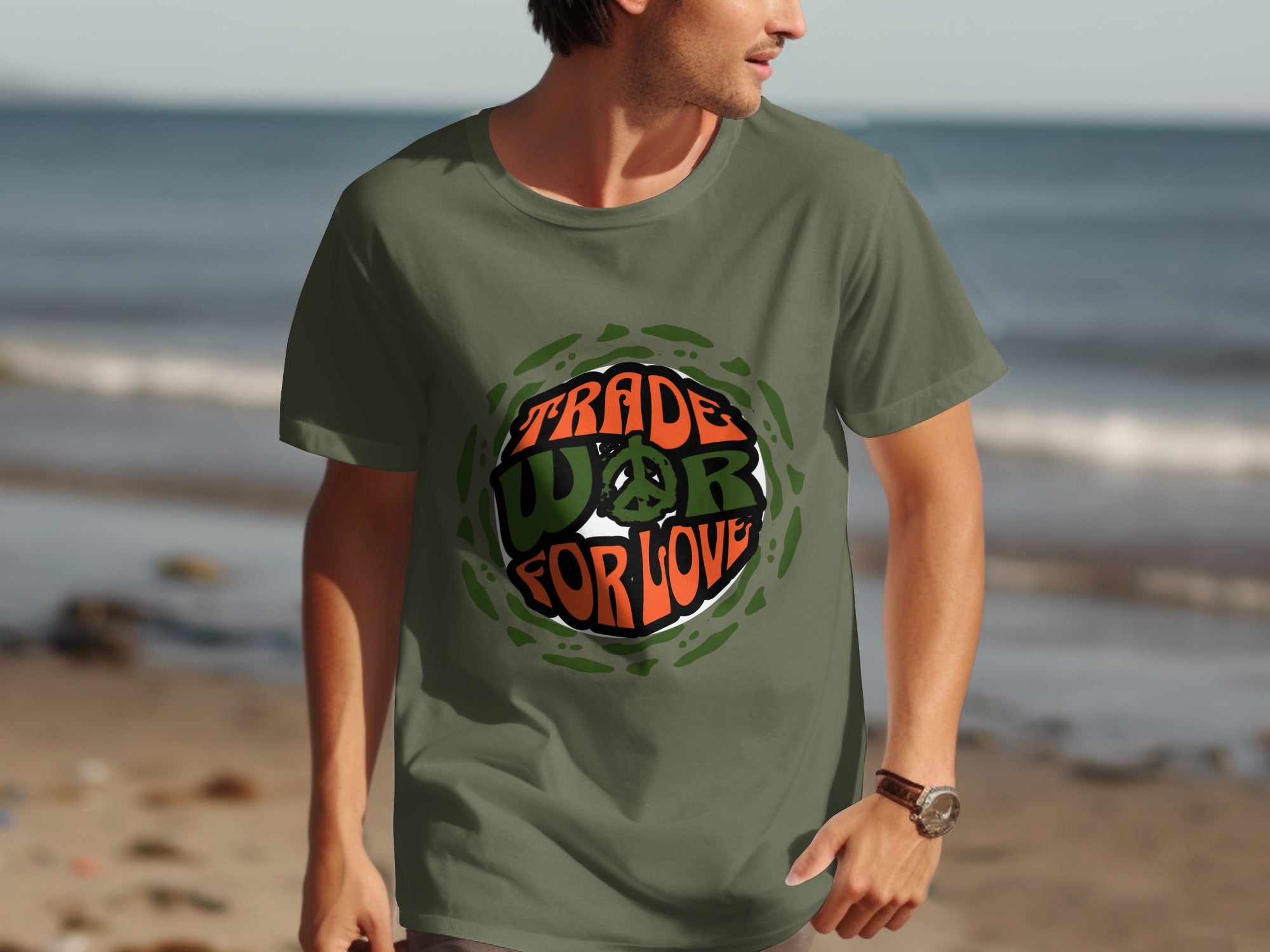 Olive t-shirt with "Trade War for Love" peace symbol graphic on beach.