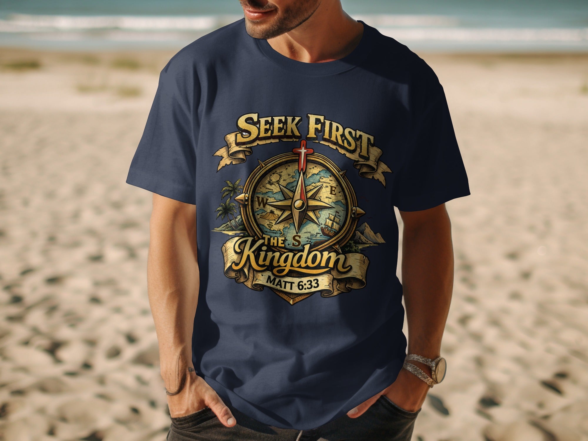 Navy t-shirt with graphic of compass, cross, and text "Seek First The Kingdom".