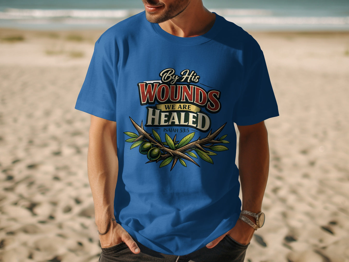 Blue t-shirt with "By His Wounds We Are Healed Isaiah 53:5" text and thorny branches.