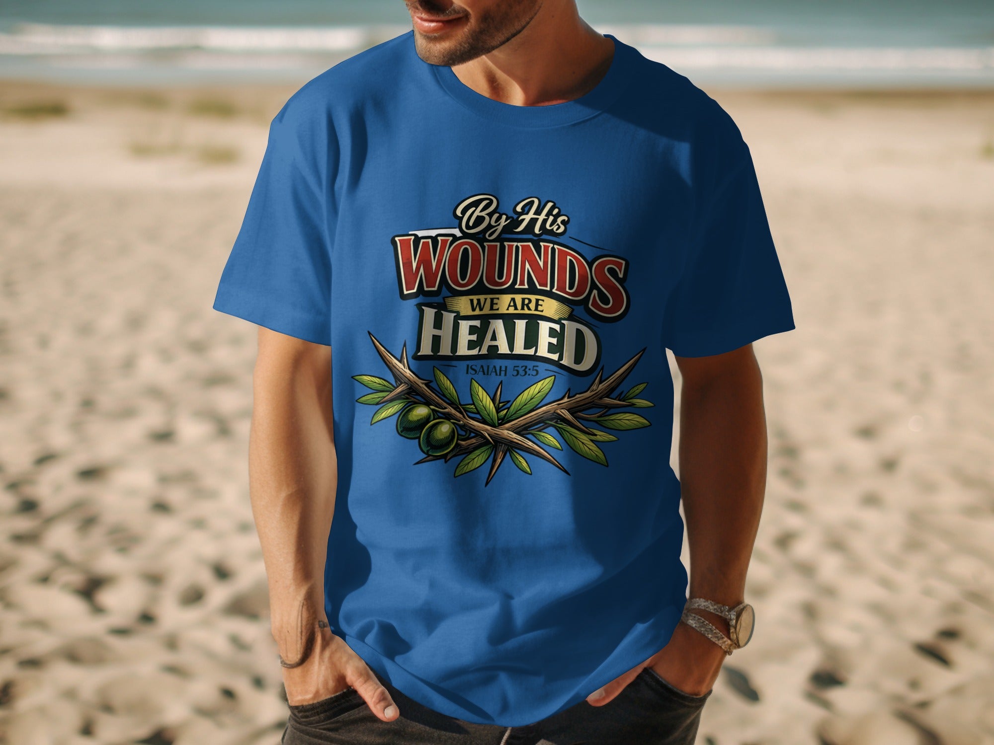 Blue t-shirt with "By His Wounds We Are Healed Isaiah 53:5" text and thorny branches.