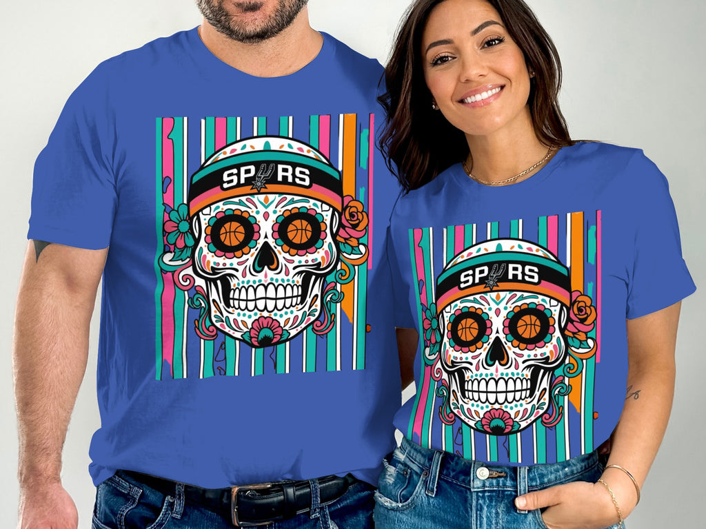 Couple wearing matching blue t-shirts with a sugar skull graphic and SPURS logo