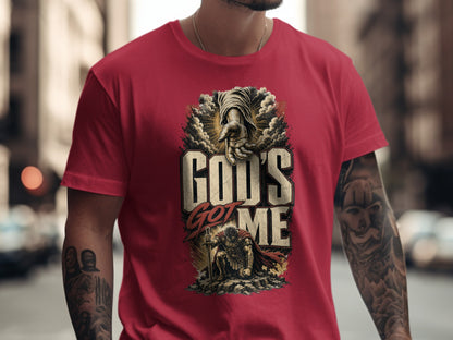 Red t-shirt with graphic of a hand reaching down and text "God's Got Me."