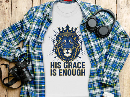White t-shirt with a blue and gold lion graphic and text "His Grace Is Enough".
