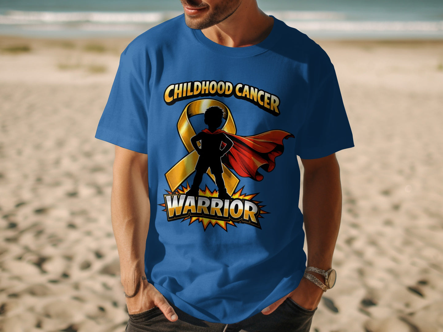 Blue t-shirt with yellow ribbon and superhero silhouette saying "Childhood Cancer Warrior".