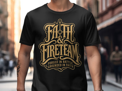 Black t-shirt with gold text: Faith & Fireteam, forged in battle, grounded in faith.
