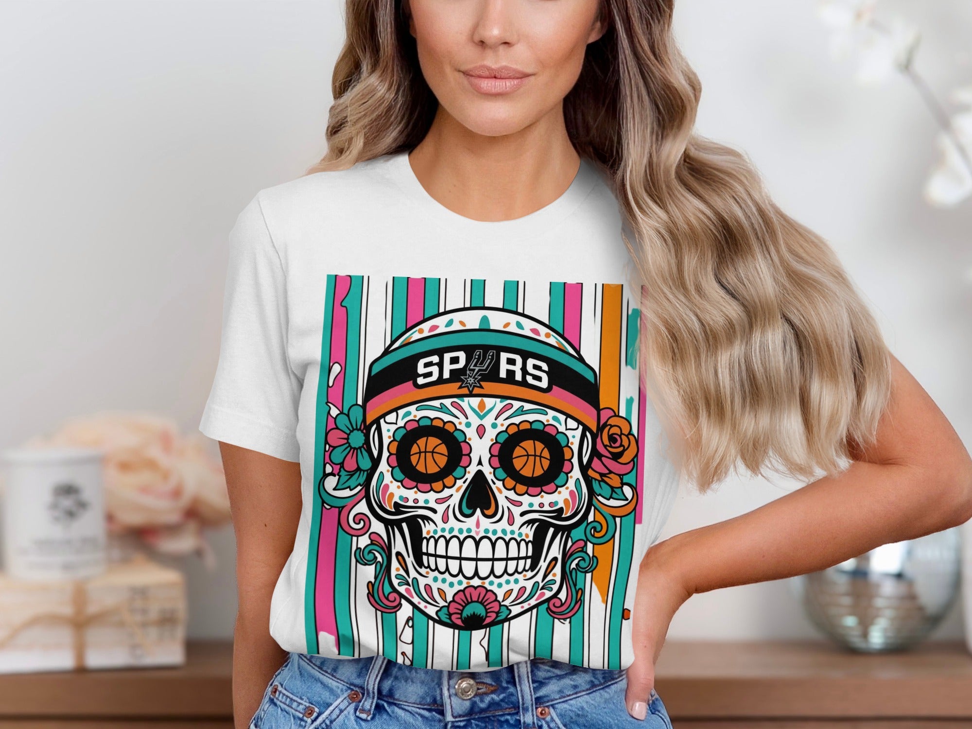White t-shirt with colorful sugar skull graphic and "SPURS" text.
